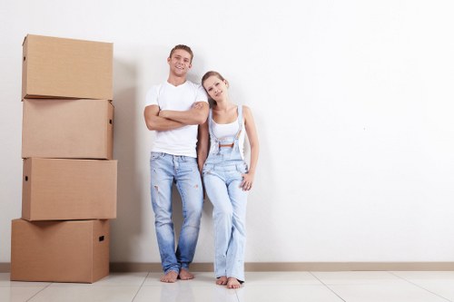 Office removals planning in Enfield with moving boxes and furniture