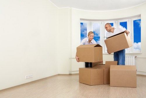 Furniture being carefully loaded for a flat move in Enfield