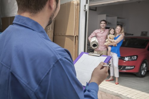 Local moving van handling furniture and boxes in Enfield