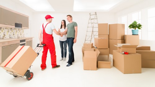 Professional man with a van assisting a small move in Enfield