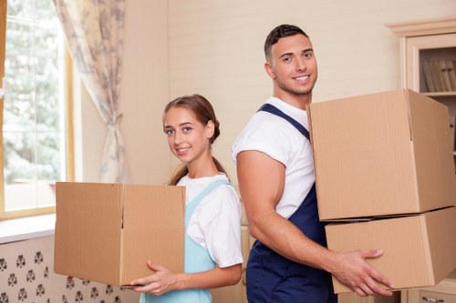 Movers loading household items from an Enfield property